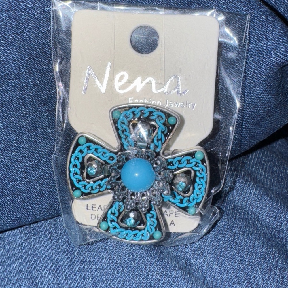 Nena Turquoise and Silver Ring lead and Nicklaus safe